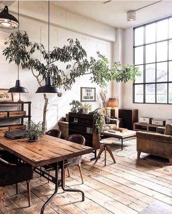 Wooden furniture and flooring in the small rustic living room