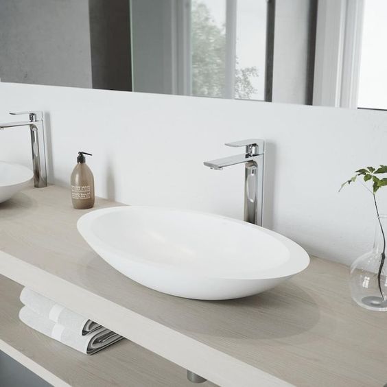 Oval vessel bathroom sinks