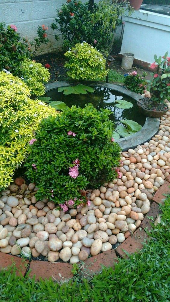 Rustic garden ponds with Mexican beach pebbles