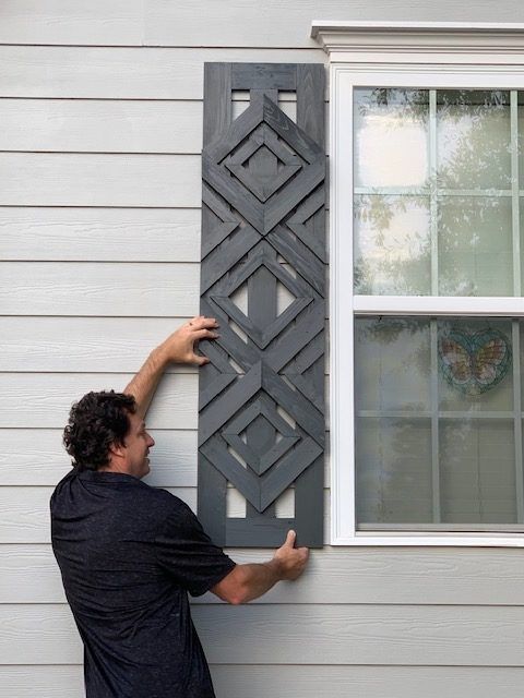 Dark grey unique shape rustic shutters