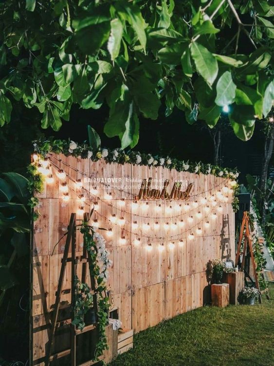 Rustic outdoor wedding photo zone