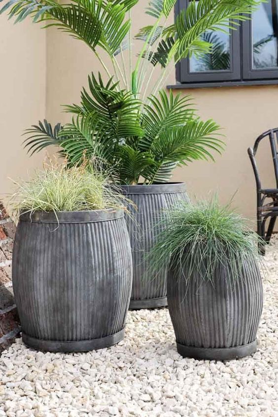 Light grey stone outdoor plant pot