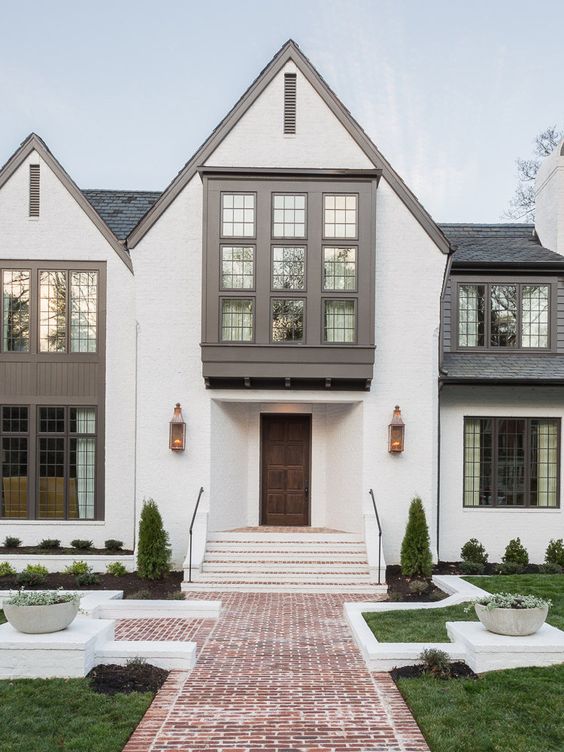 White and dark grey bohemian home exterior